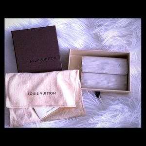 LVT creamy zebra striped wallet and coin purse.